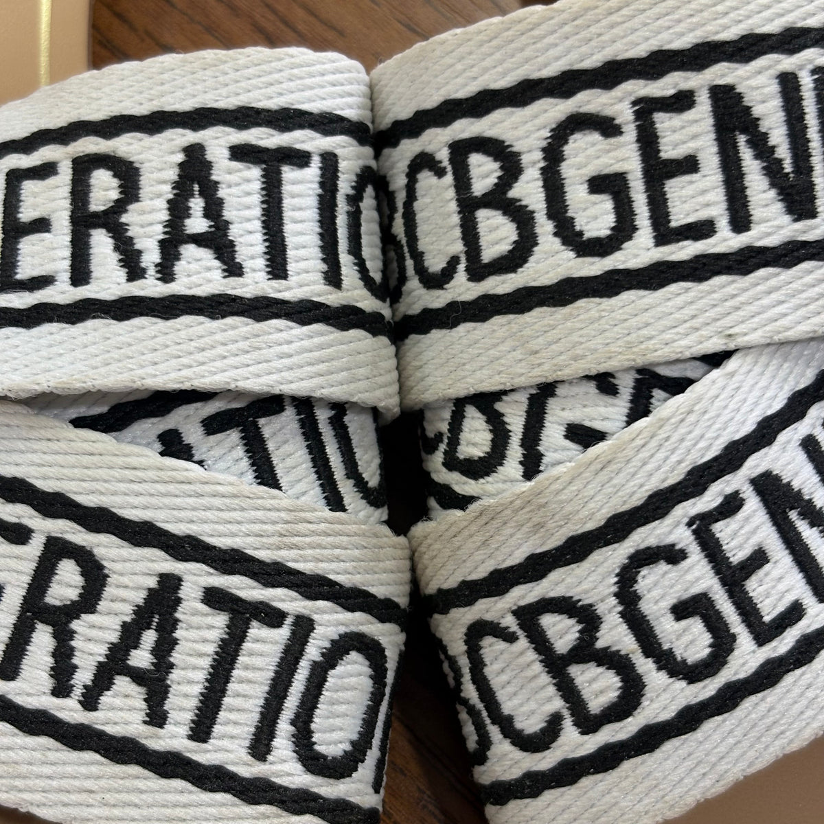 BCBGeneration White & Black Krista Crisscross Logo Sandals | Pre Loved |