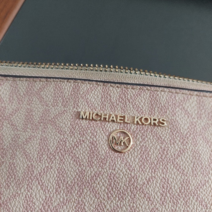 Michael Kors Pink Signature Logo Medium Wristlet | Pre Loved |