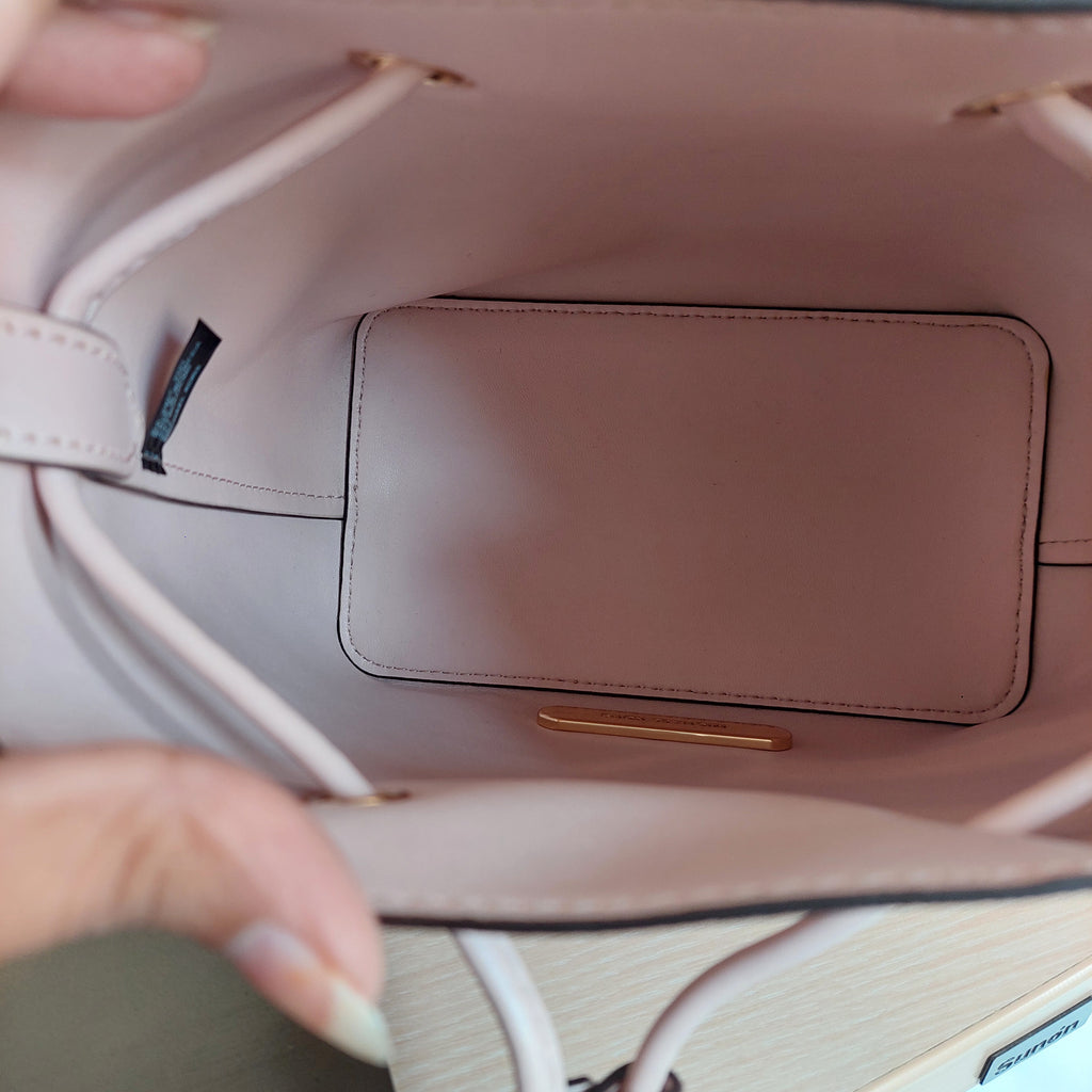 Michael Kors Powder Blush Monogrammed Canvas 'Suri' Small Bucket Bag | Gently Used |