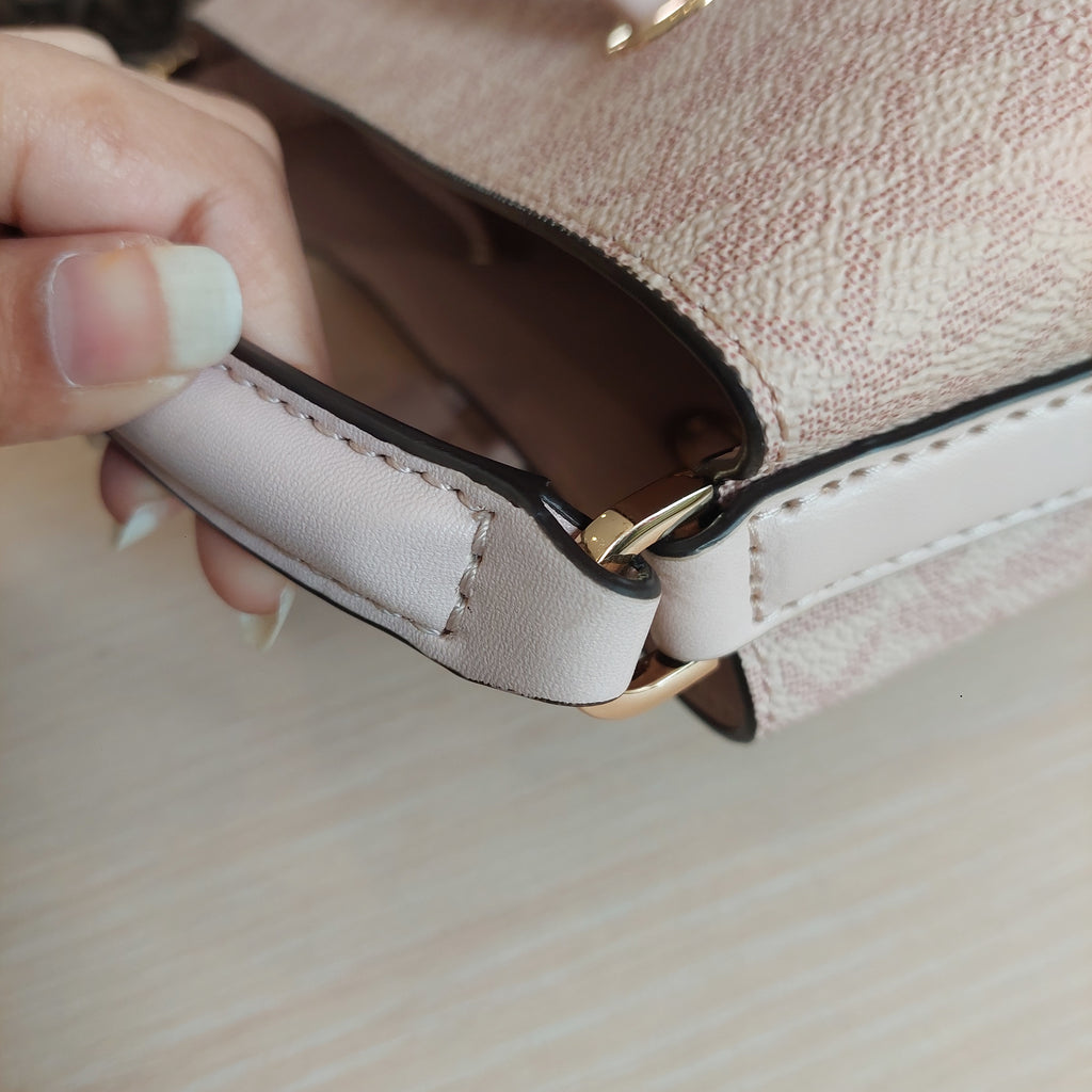 Michael Kors Powder Blush Monogrammed Canvas 'Suri' Small Bucket Bag | Gently Used |