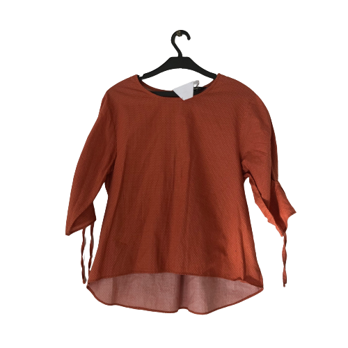 Max orange polka dot top