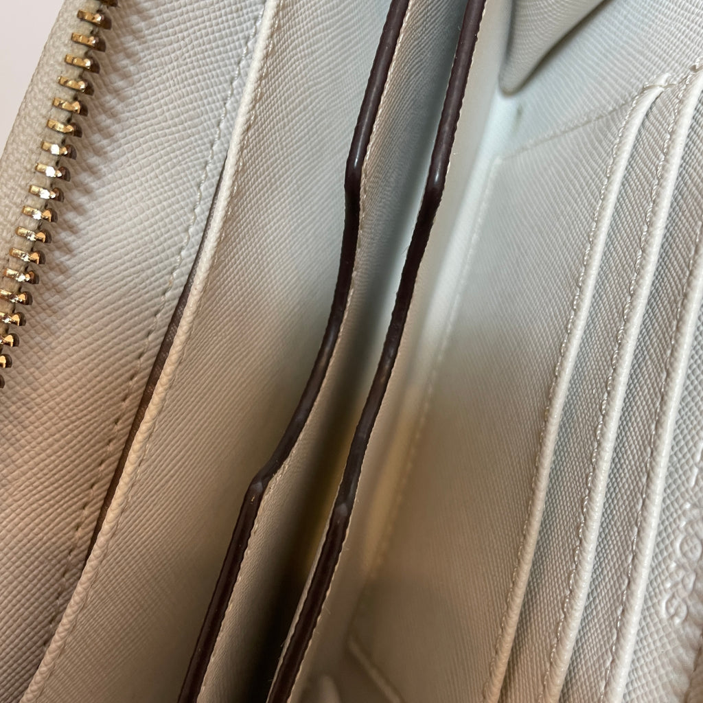 Michael Kors Vanilla Monogram Wristlet | Gently Used |